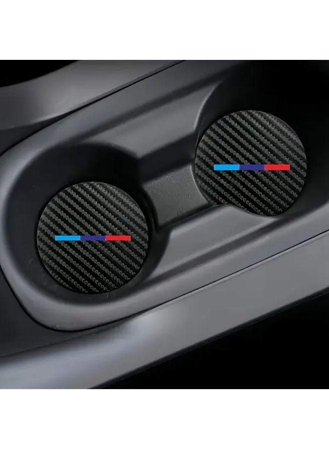حامل أكواب BMW X M Series 2 قطعة مانع للانزلاق من ألياف الكربون بشريط أزرق وأحمر - Image 1